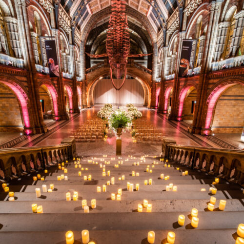 candlelit staircase leading to wedding ceremony space