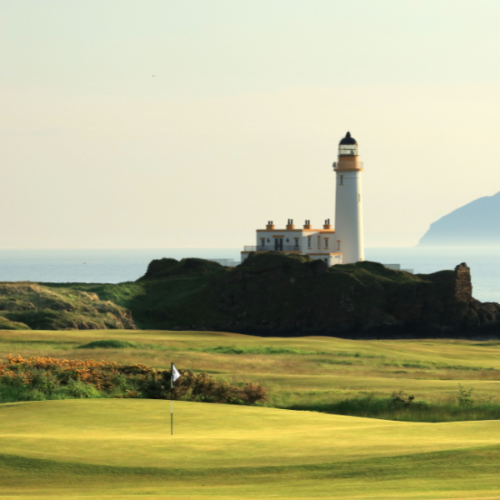 View a golf course, lighthouse and the sea